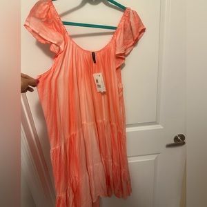 NWT Raviva women’s medium orange dress. Loose fit. 100% rayon. Ruffle detail